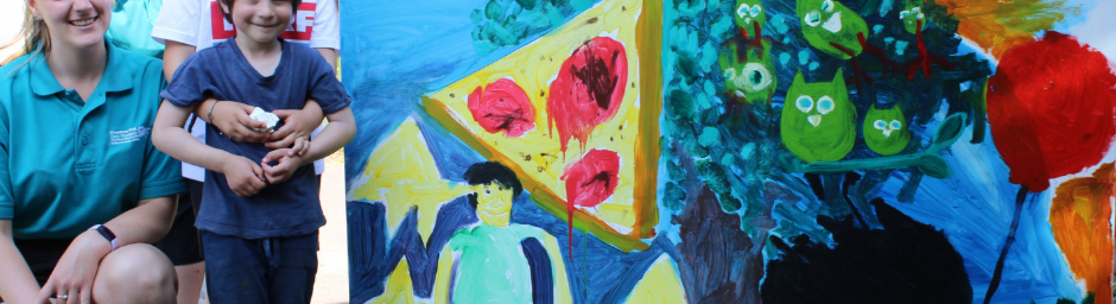 Presenting the painting - Wivenhoe Park Day Nursery