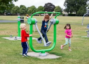 Children on exercise equipment